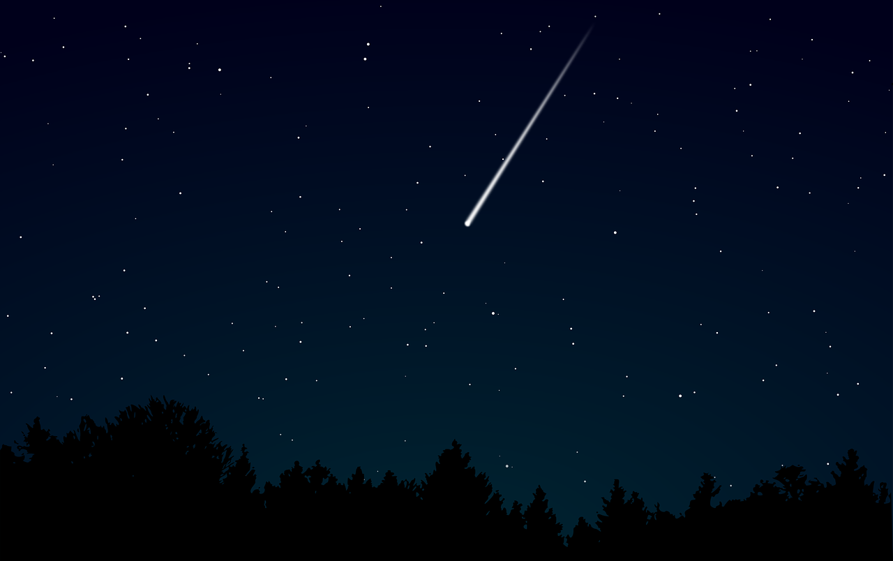 Eine Sternschnuppe am Himmel in der Nacht